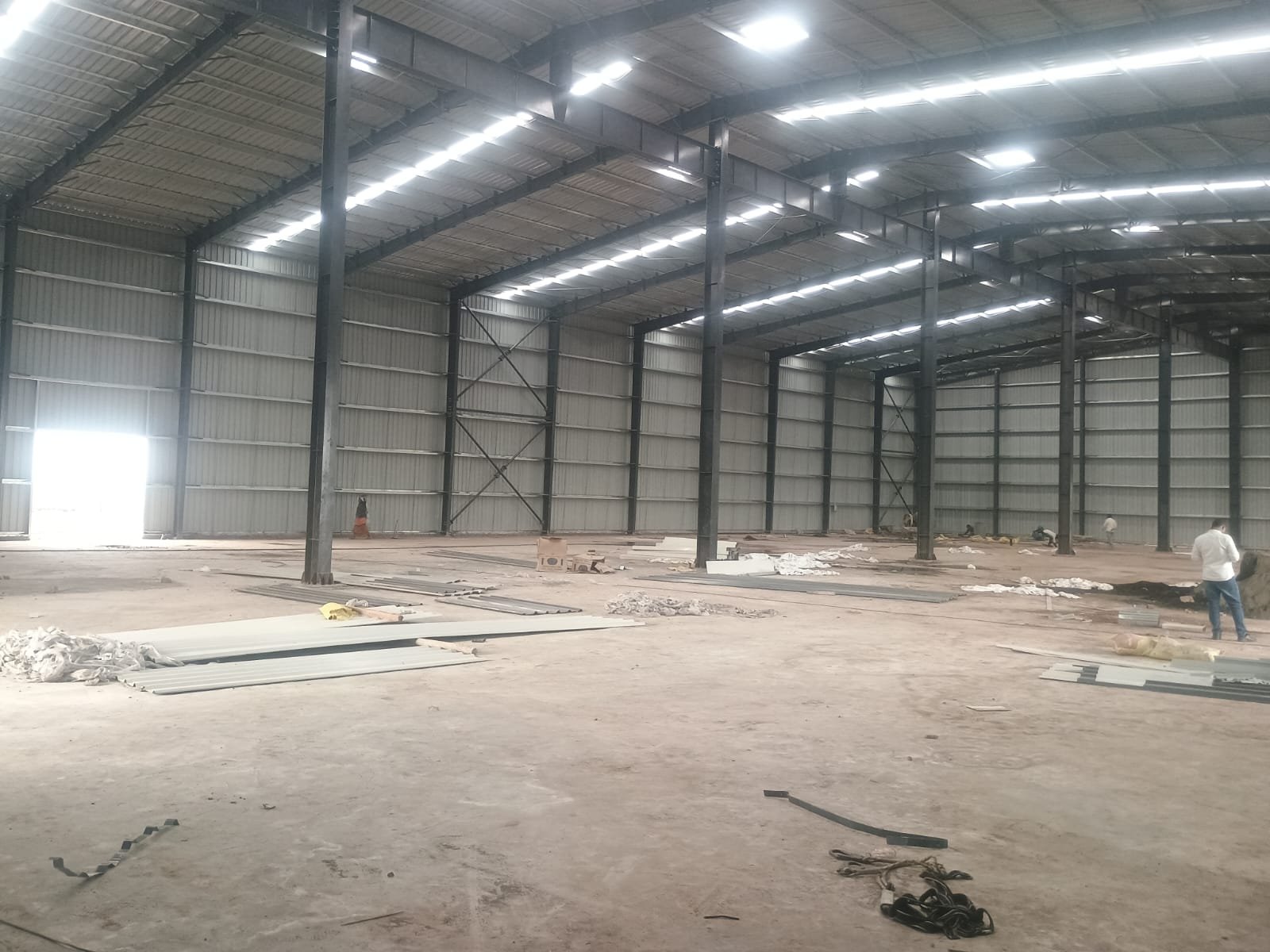 Clear-span warehouse interior with roof daylight panels